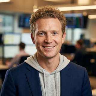 Ryan Brooks, listed as Lead Trading Analyst at Rendovault, in a profile image
